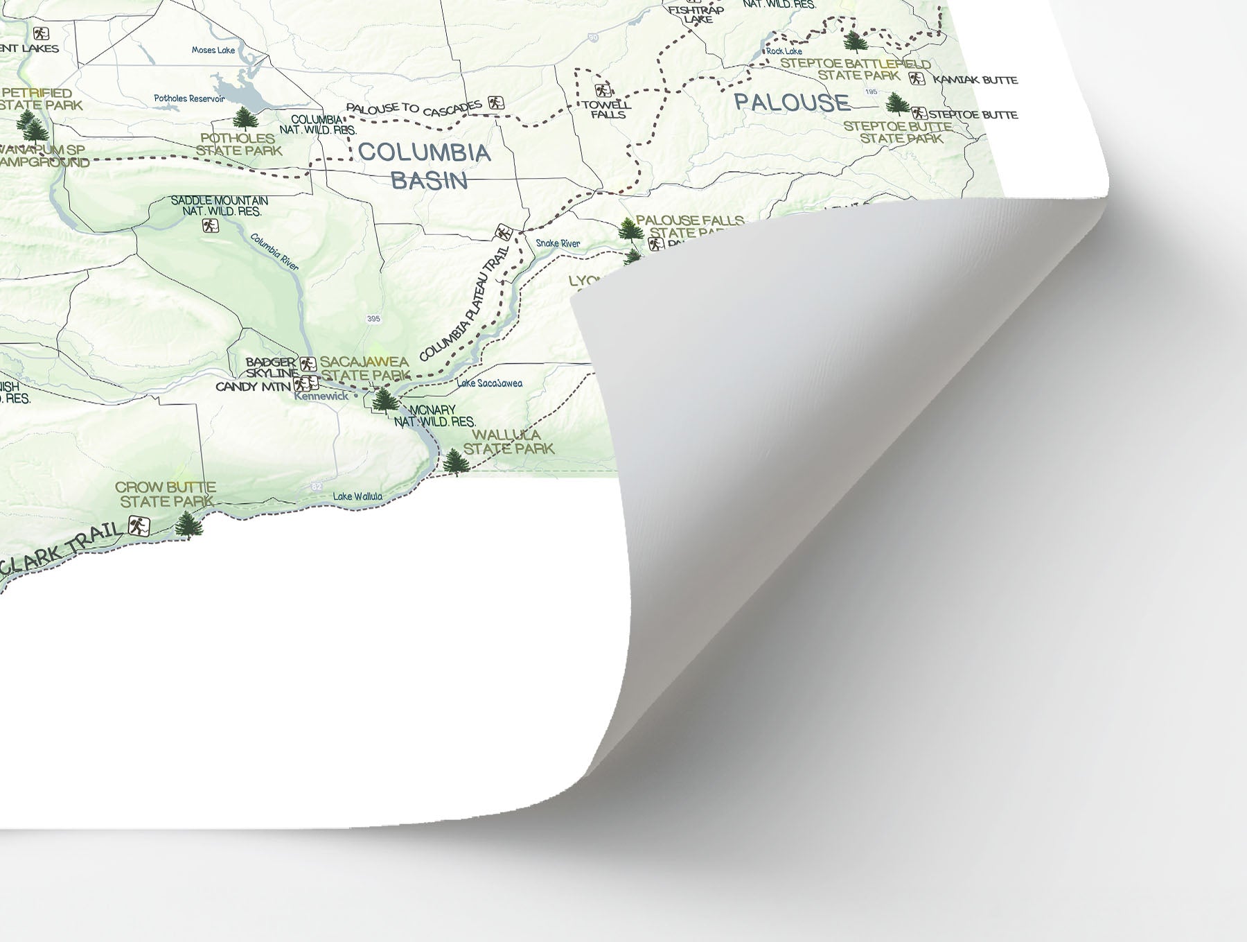 Washington State Parks Map showing thick paper by lifting corner