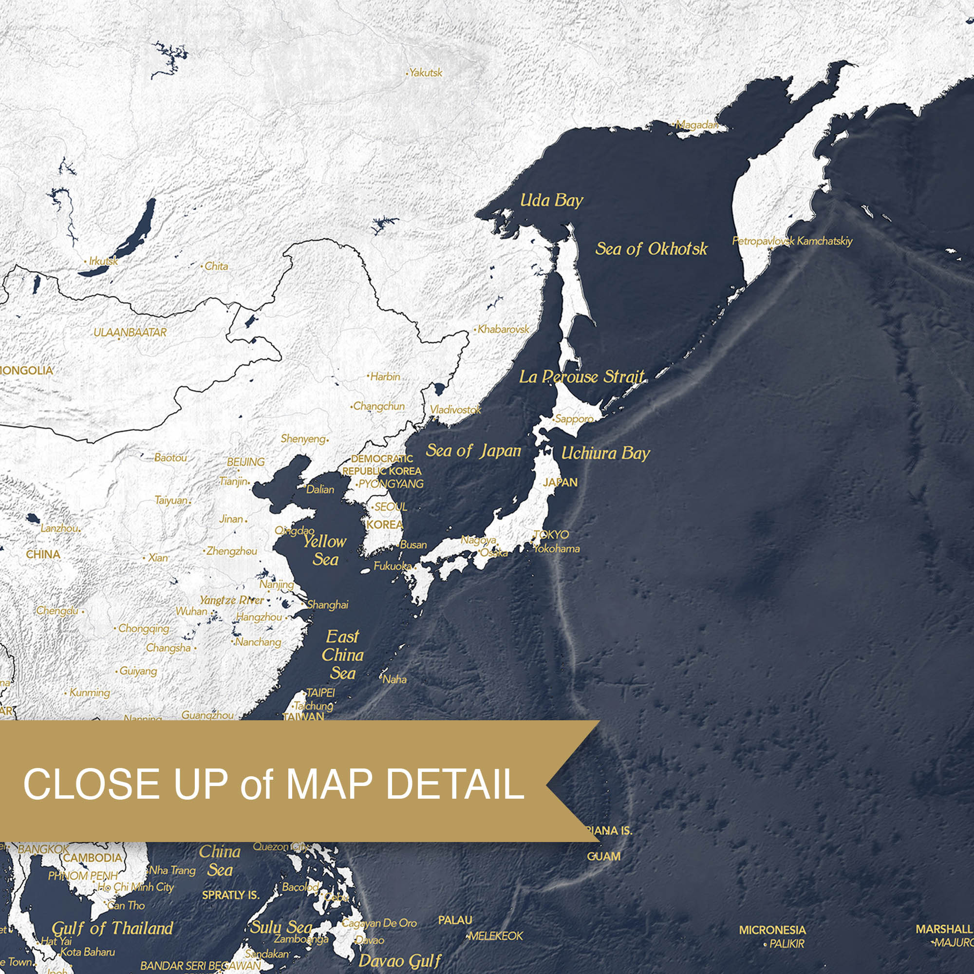 Location detail close-up of Adventure Awaits World Map in navy and gold