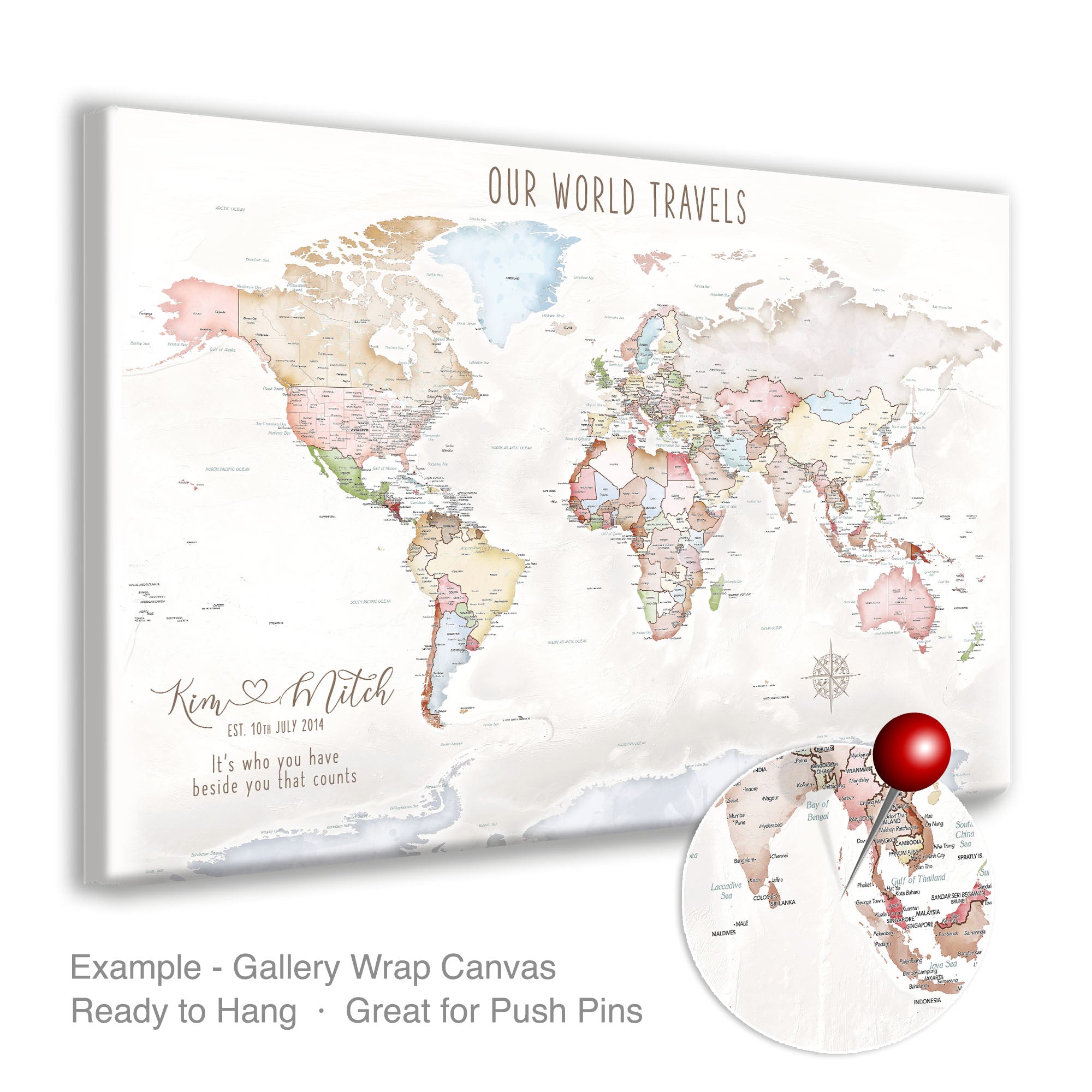Customized pastel anniversary world map on gallery-wrap canvas with names and travel quote.